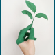 Nachhaltigkeit - Grüne Hand mit grünem Blatt